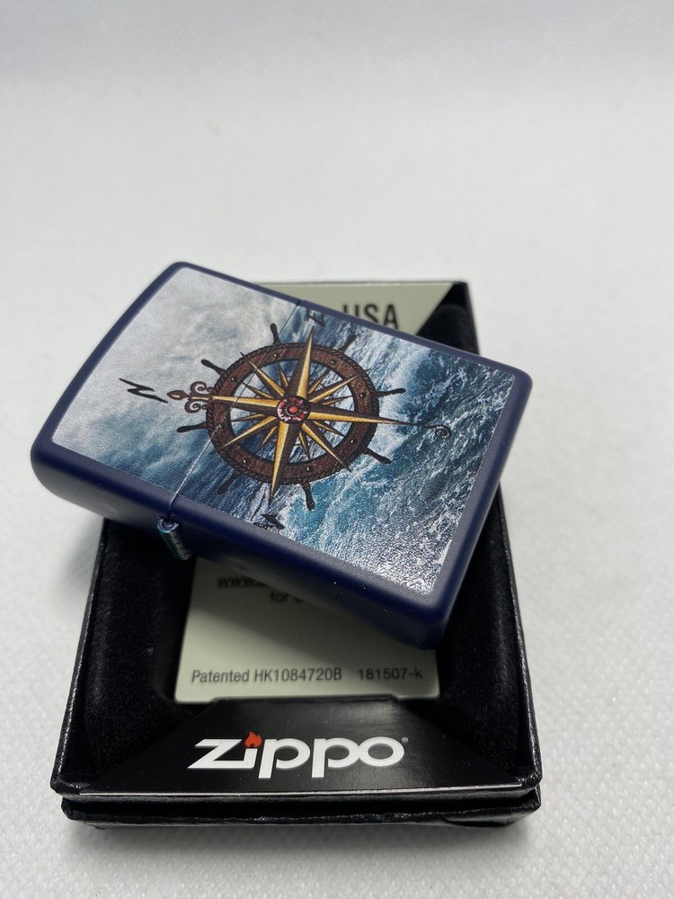 Zippo Compass On A Navy Blue Lighter