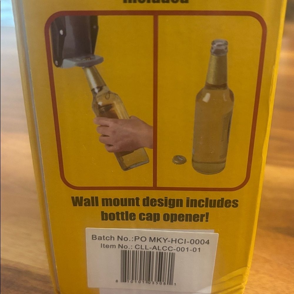 McKay Wall Mounted Can Crusher in Black includes bottle opening function