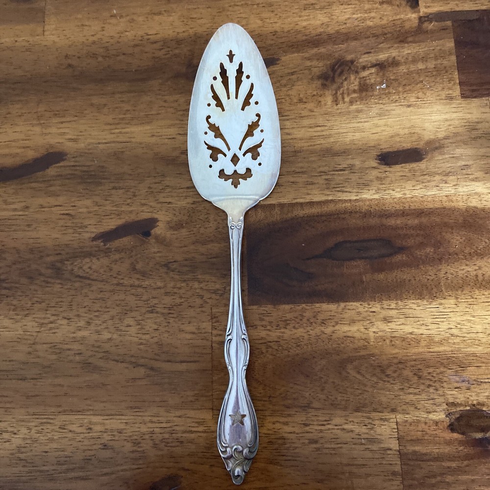 Rogers Oneida9 1/2”  Pie server With Star Stamped At The Bottom