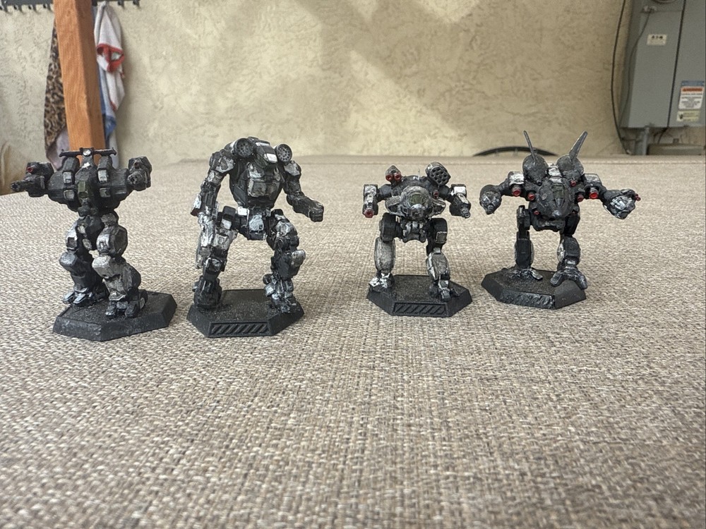 3-D Printed Battle Tech Miniatures Painted In A Pirate Scheme