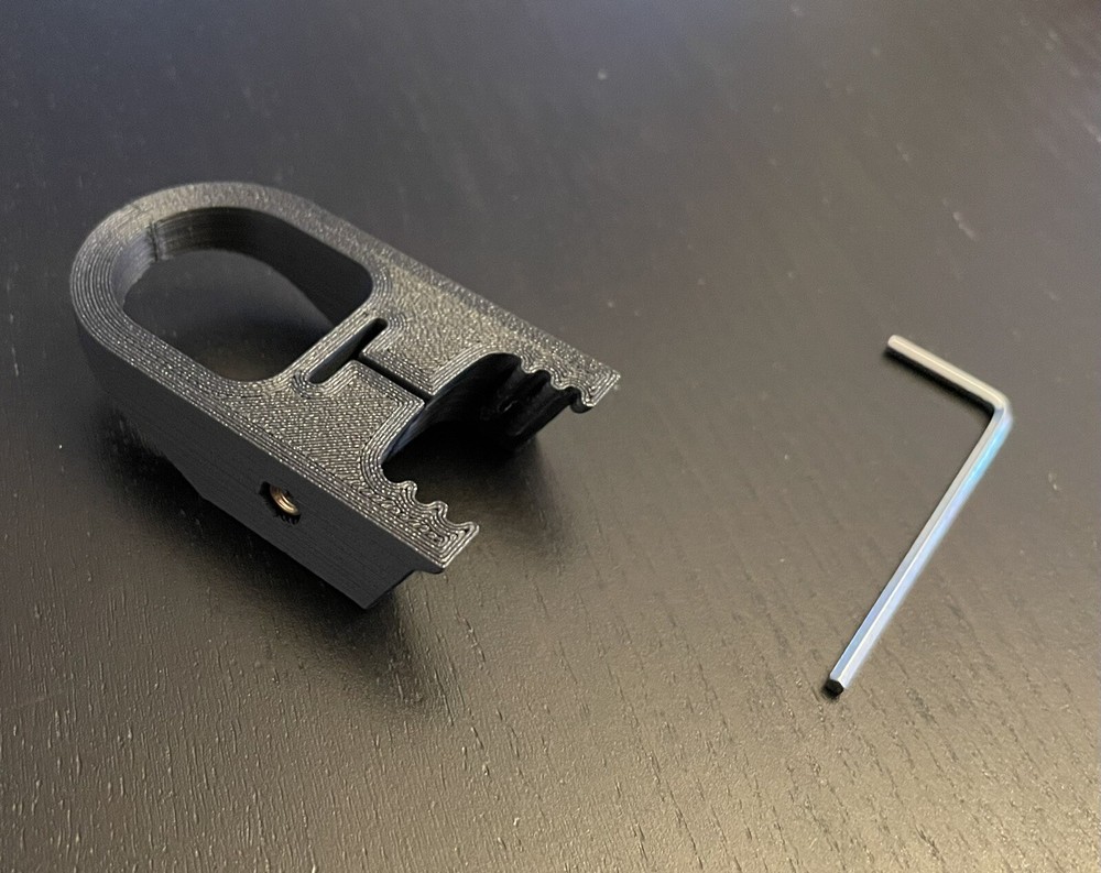 Smith & Wesson model 22A finger loop charger, slide racker.