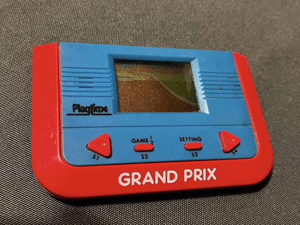 Playtime Grand Prix Handheld Electronic Console- LCD Screen 1980's- Working