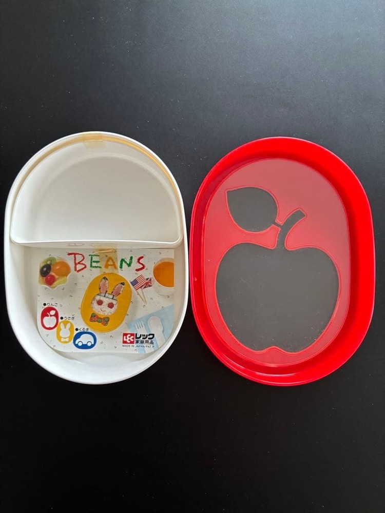 Showa retro bento box with visible inside apple