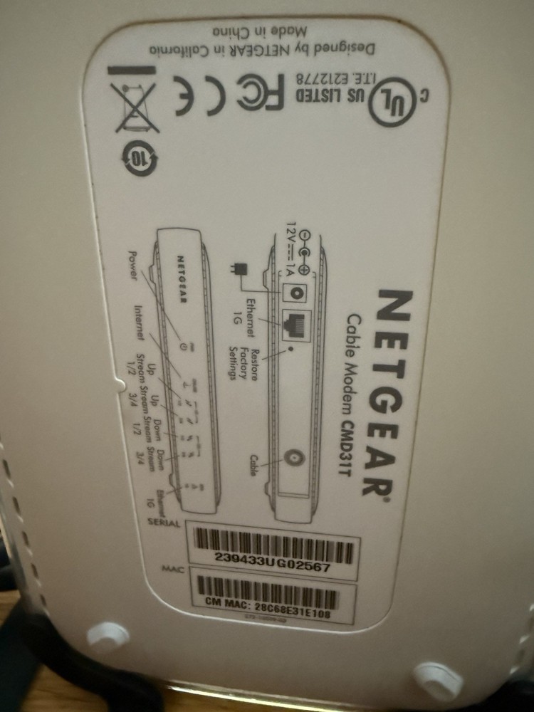 Netgear Cable Modem, Router, and Two Signal Boosters With Cables