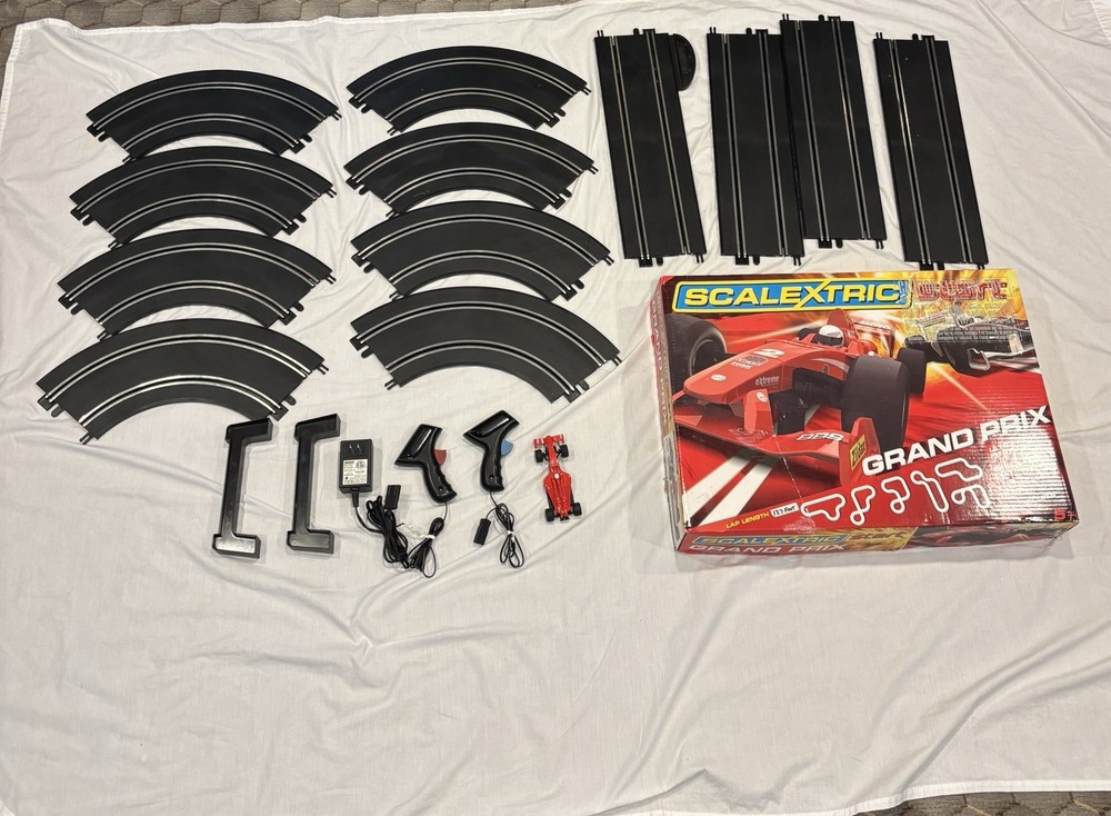 Scalextric 1/32 11 Track, Power base, Controllers, AC Adapter, 2 Risers, Box