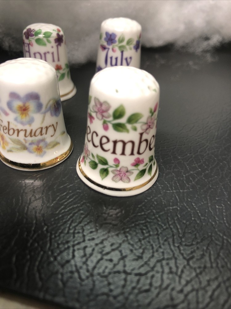 Months china thimbles April, July, Feb, Dec