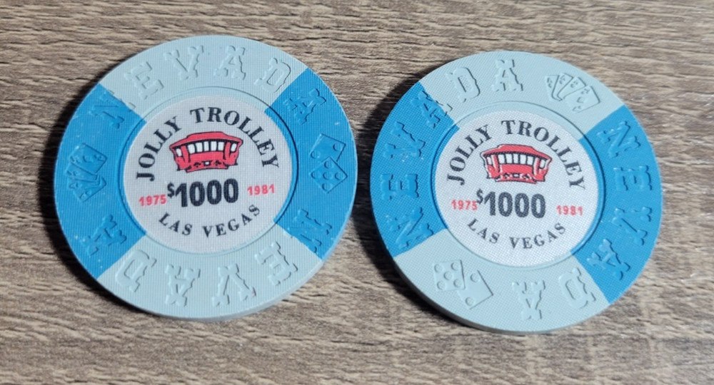 2 PIECE OBSOLETE JOLLY TROLLEY COMMEMORATIVE $1000 CHIPS NCV