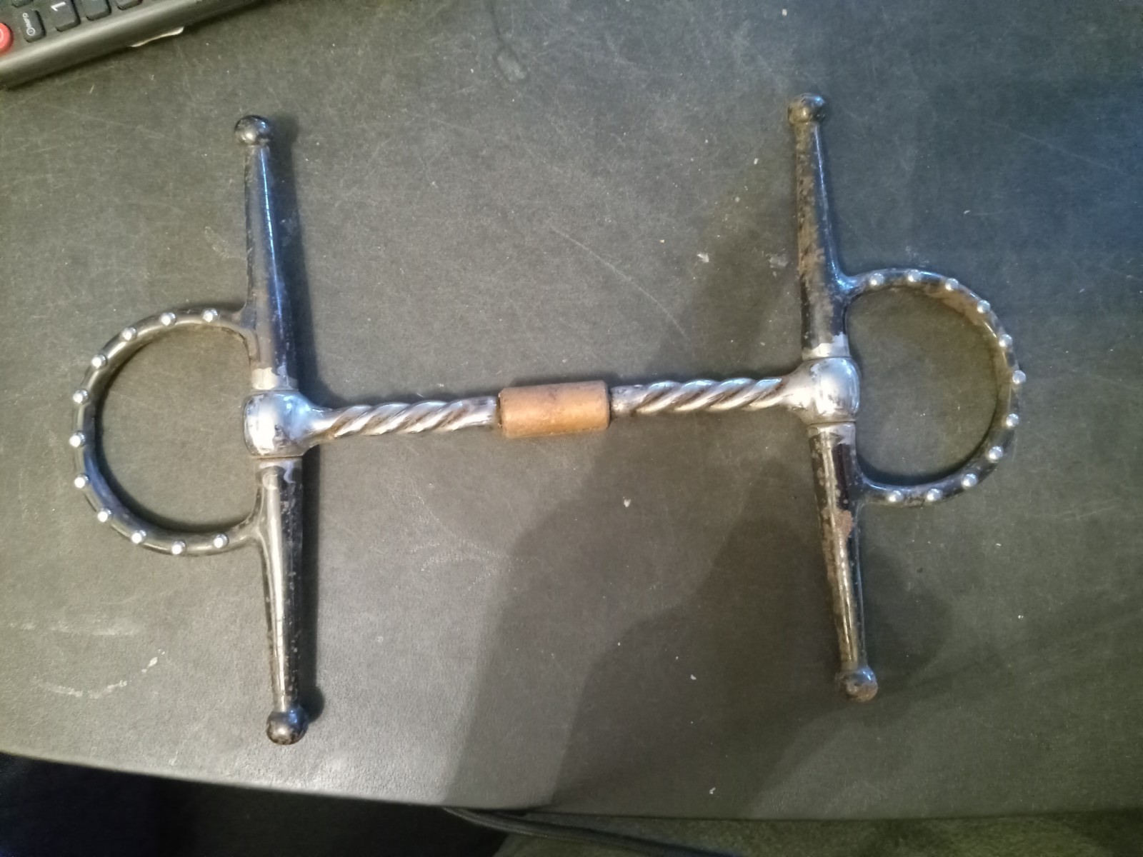 Used full cheek  Bit 5 1/4 in twisted wire copper barrel mouth dots