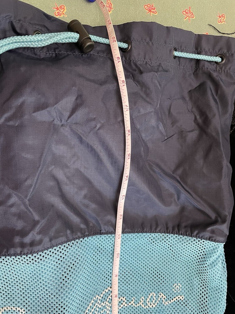 Eddie Bauer navy and teal drawstring bag with backpack straps
