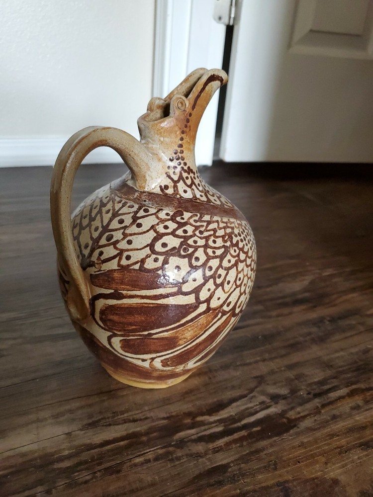 Amazing Pottery Pitcher Signed SF