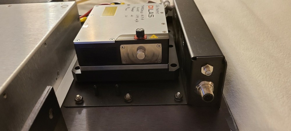 Coherent Laser Dilas with cooling block, interface unit and power supply.