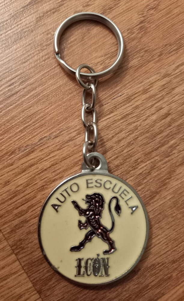 Leon driving school vintage key ring