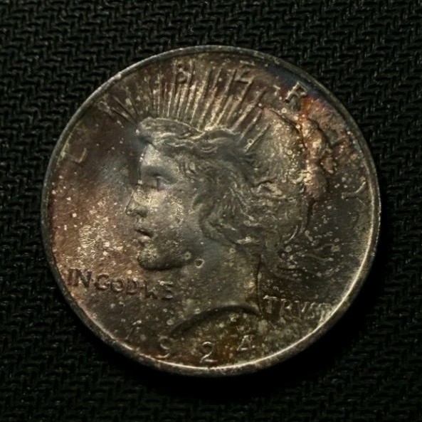 original rainbow toned 1924 Peace Dollar $1  Gem BU