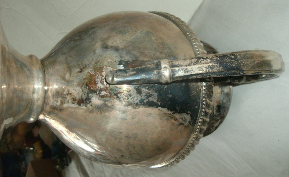 VINTAGE SILVER ON COPPER PITCHER, ENBLEM ON BOTTOM, 9 1/2" TALL