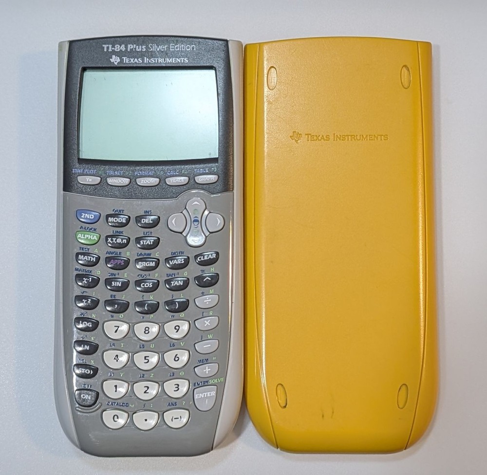 Texas instruments TI-84 Plus Silver Edition Graphing Calculator WORKS