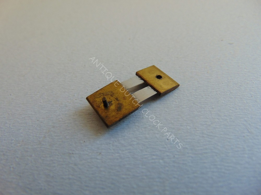 SUSPENSION SPRING FOR A GERMAN GUSTAV BECKER REGULATOR CLOCK