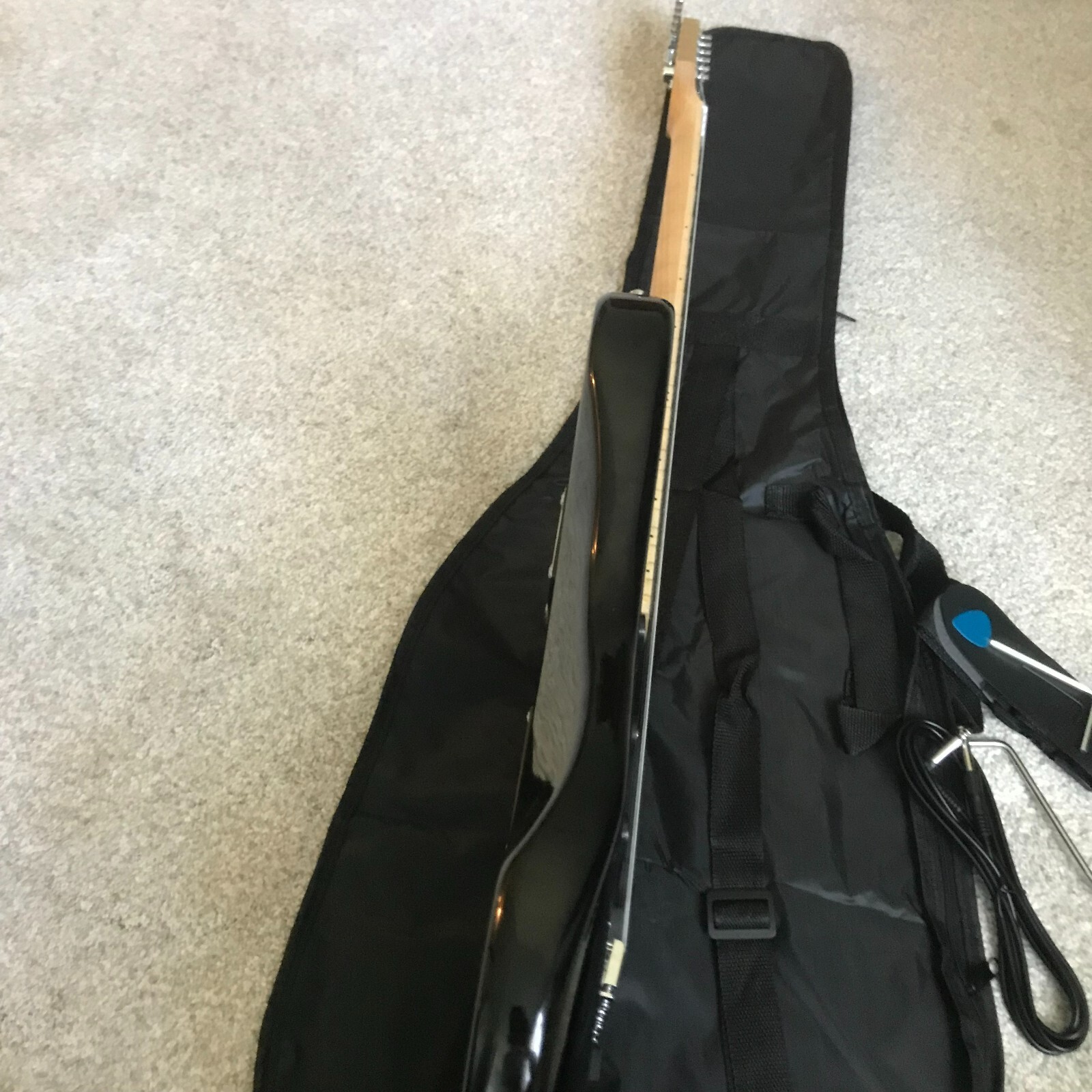 Full-Size Black Electric Guitar Starter Package with 20-Watt Amp and Accessories