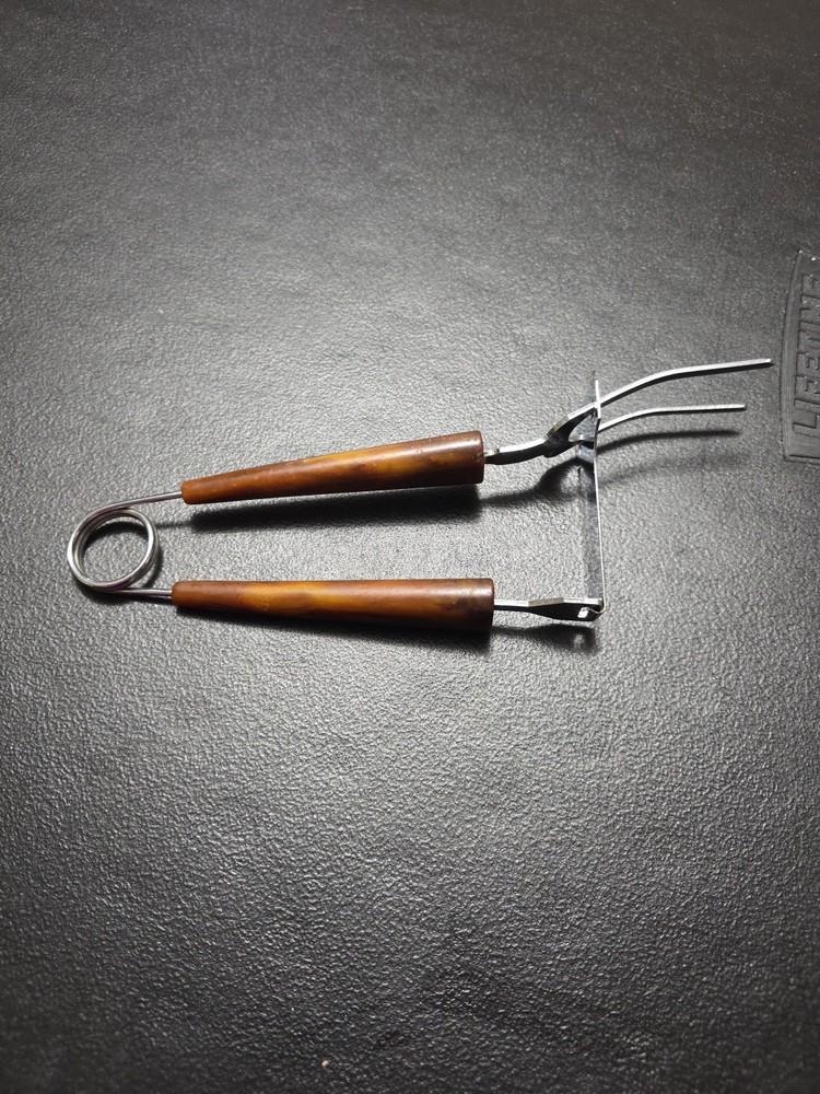 Vintage Spring Loaded Meat Serving Fork 50s Bakelite Handle