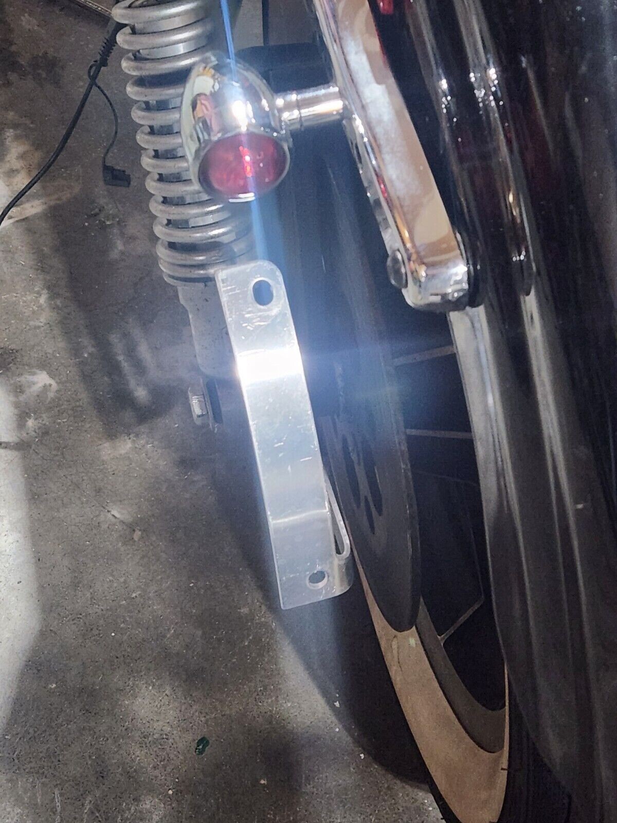 Curved License Plate Relocation Bracket for HARLEY DAVIDSON SPORTSTER All Years