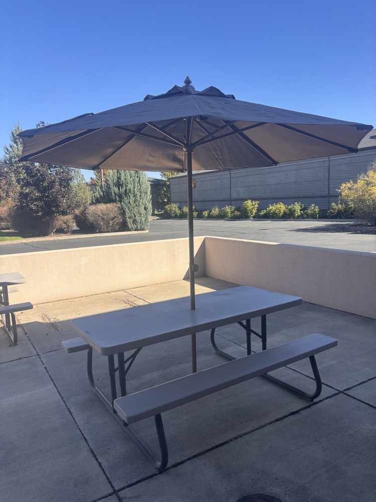 Lifetime plastic 6' table with umbrella and stand