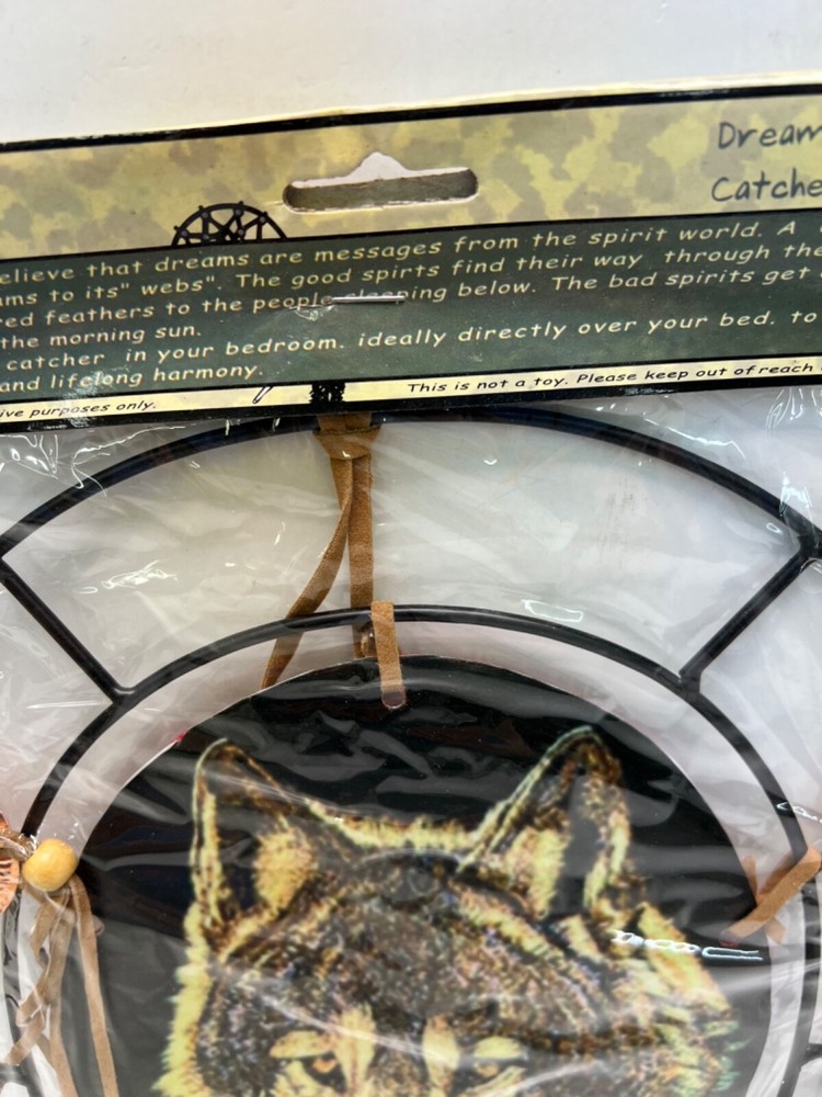 2 dream catchers new in package wolf face and wolf howling