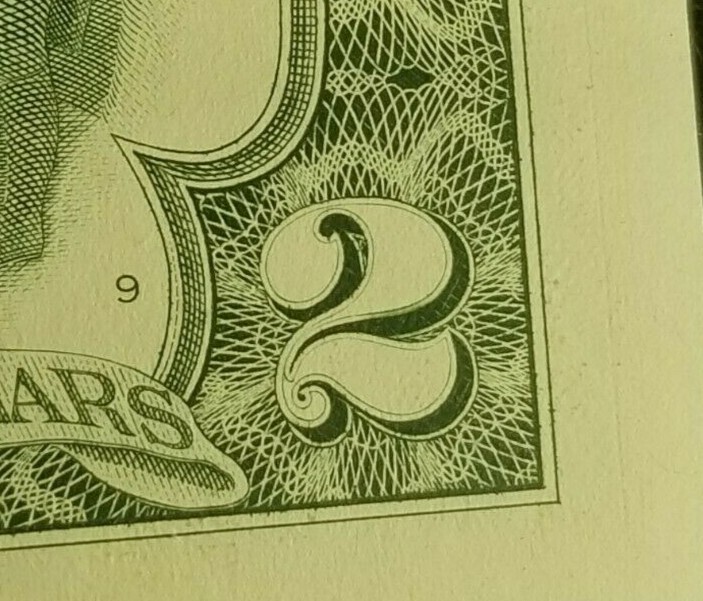 1995 $2 wet ink error note 84777848 uncirculated crisp small bookend