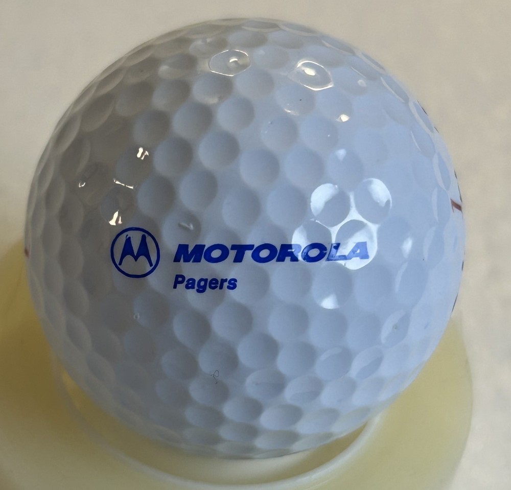 3 Motorola golf balls