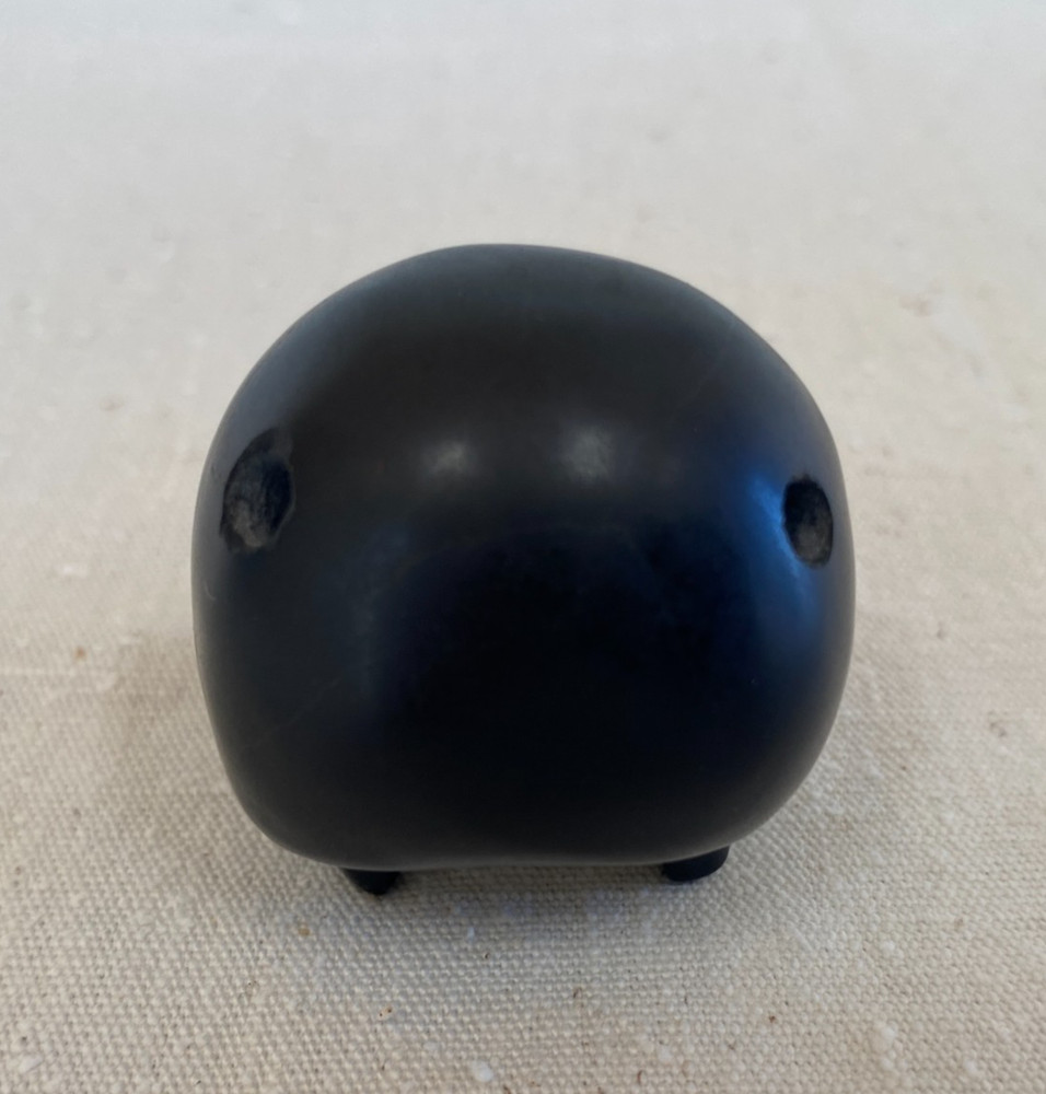 Stylized Carved Stone Skull Pendant
