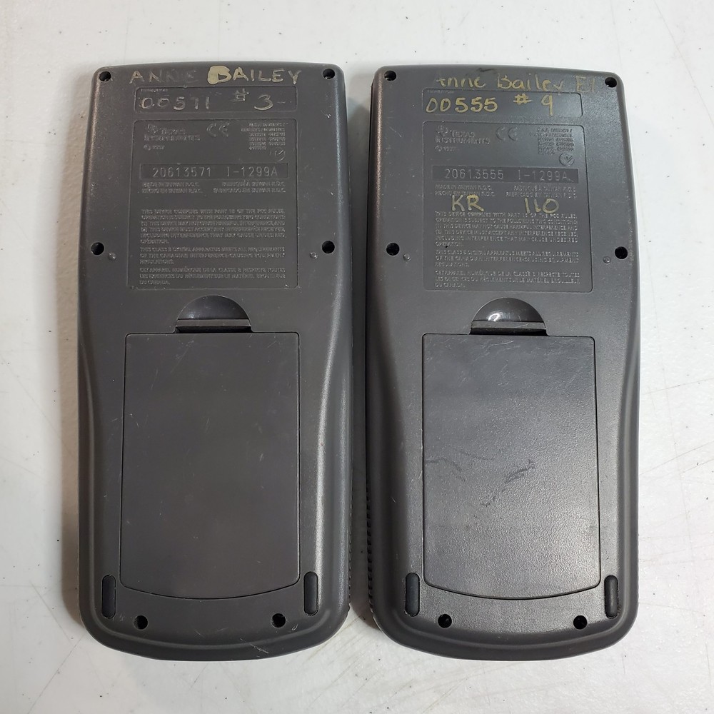 Two Texas Instruments TI-73 Graphing Calculators Used - WORK