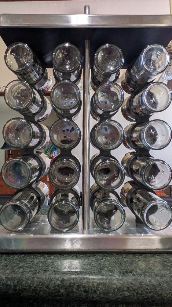 Space Saving Spice Rack with 20 Labeled Jars.