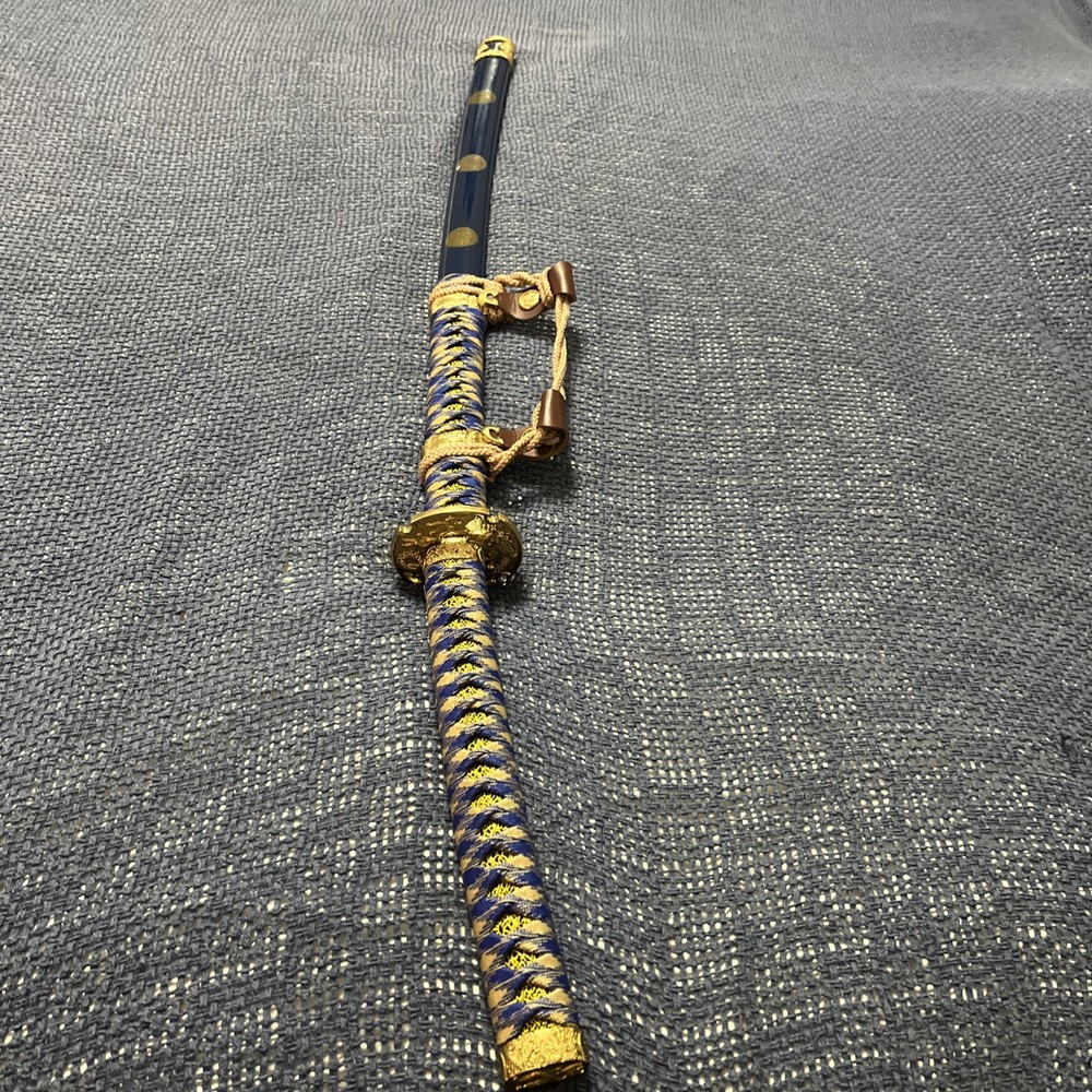 SAMURAI SWORD BLUE W/ CURVED HANDLE 40.5 “