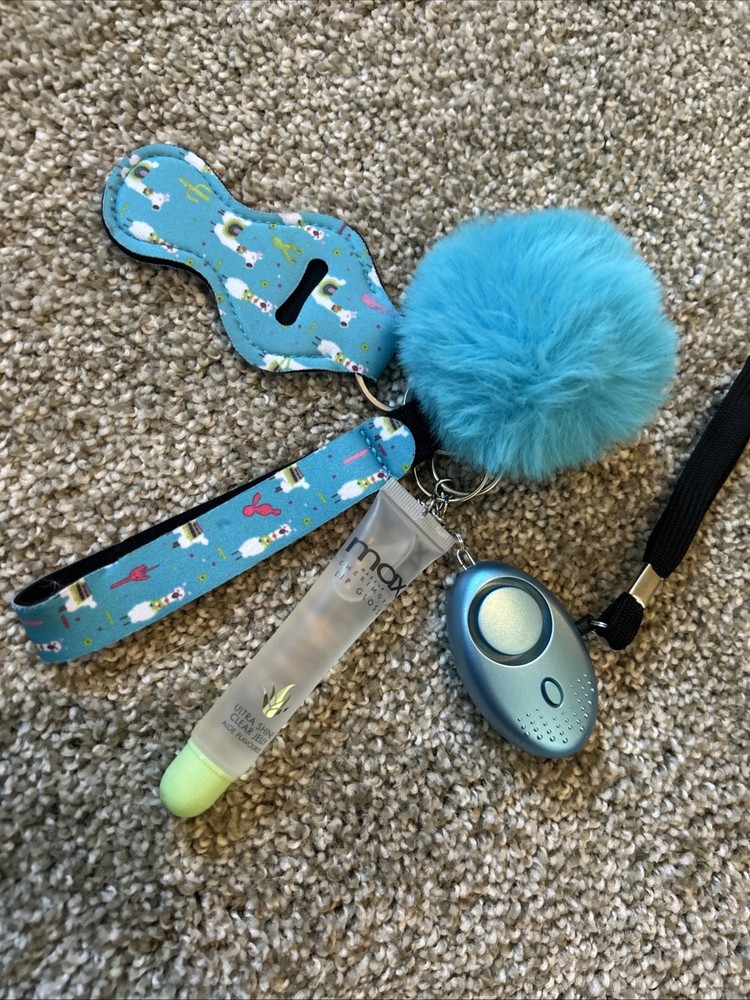 a self-defense keychain set with various accessories.