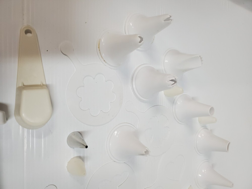 White plastic Cookie Press Disc Cutouts -with extras