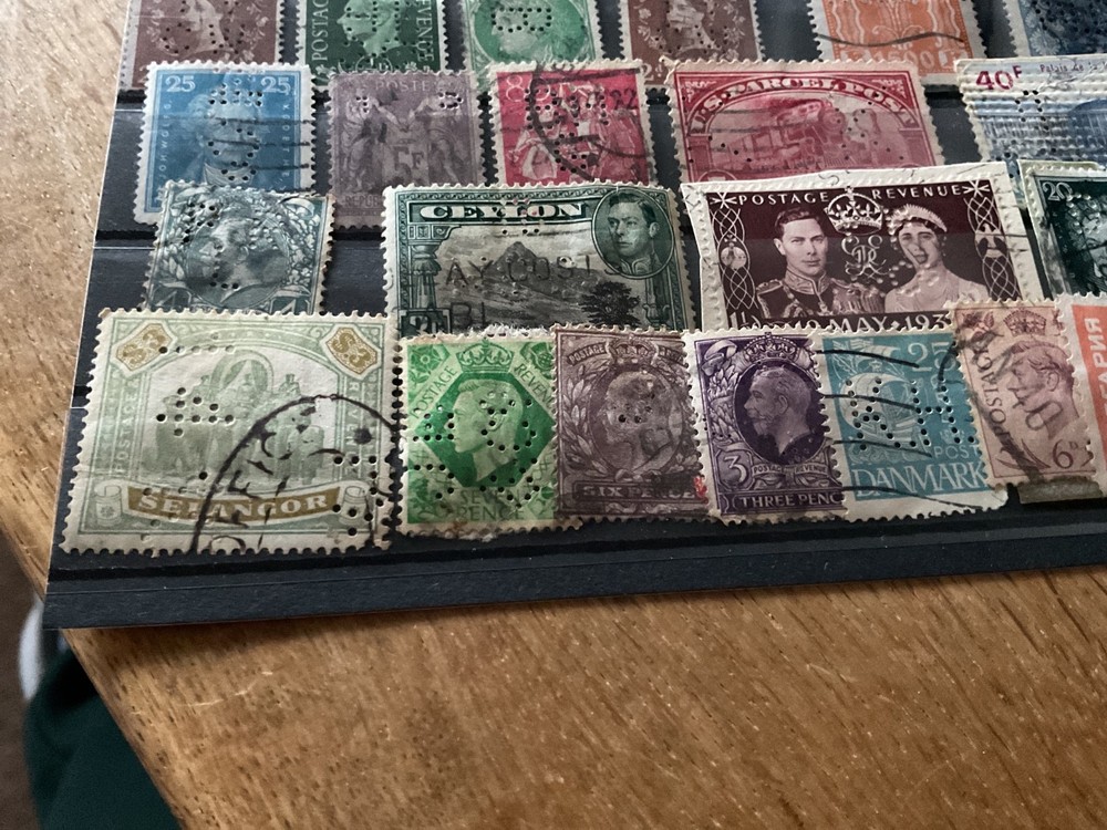 World mixed perfined punched stamps B1636