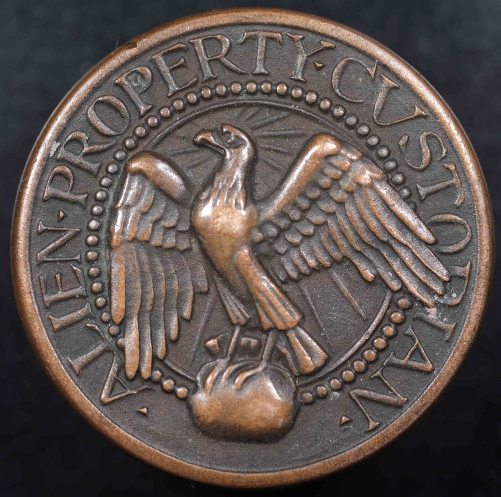 Alien Property Custodian button made by Tiffany & Co.