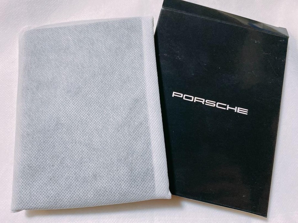 Porsche passport case black red