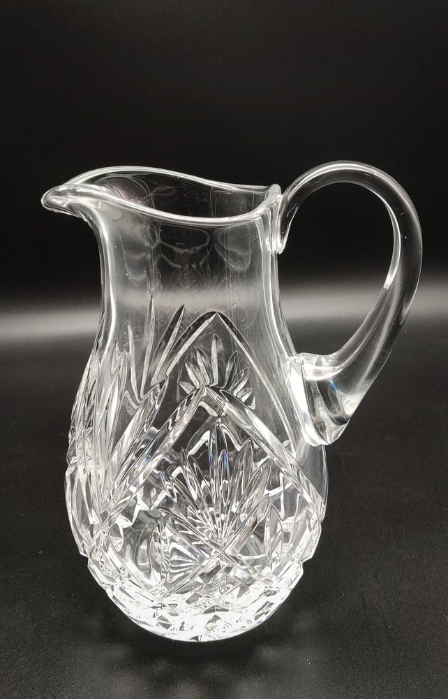 Crystal Pitcher. 8" Tall. Unsigned. Very Clear Crystal with a Beautiful Design.