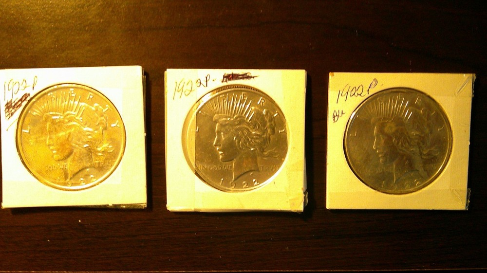 THREE 90% SILVER 1922P B.U. PEACE DOLLARS
