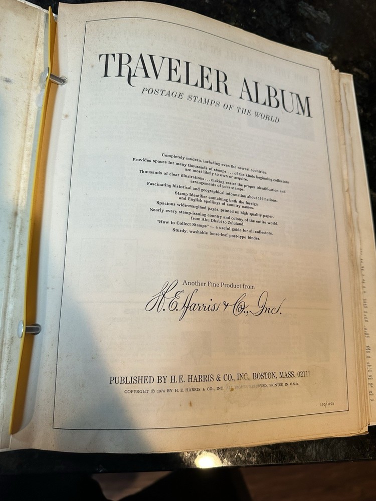 VTG 1977 Traveler Stamp Album With Many Stamps.