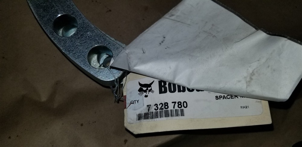 Bobcat track loader motor spacer 7328780