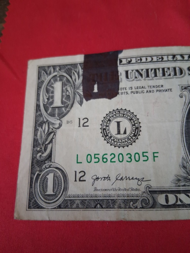 $1 Ink Smear Error with Bleed Through