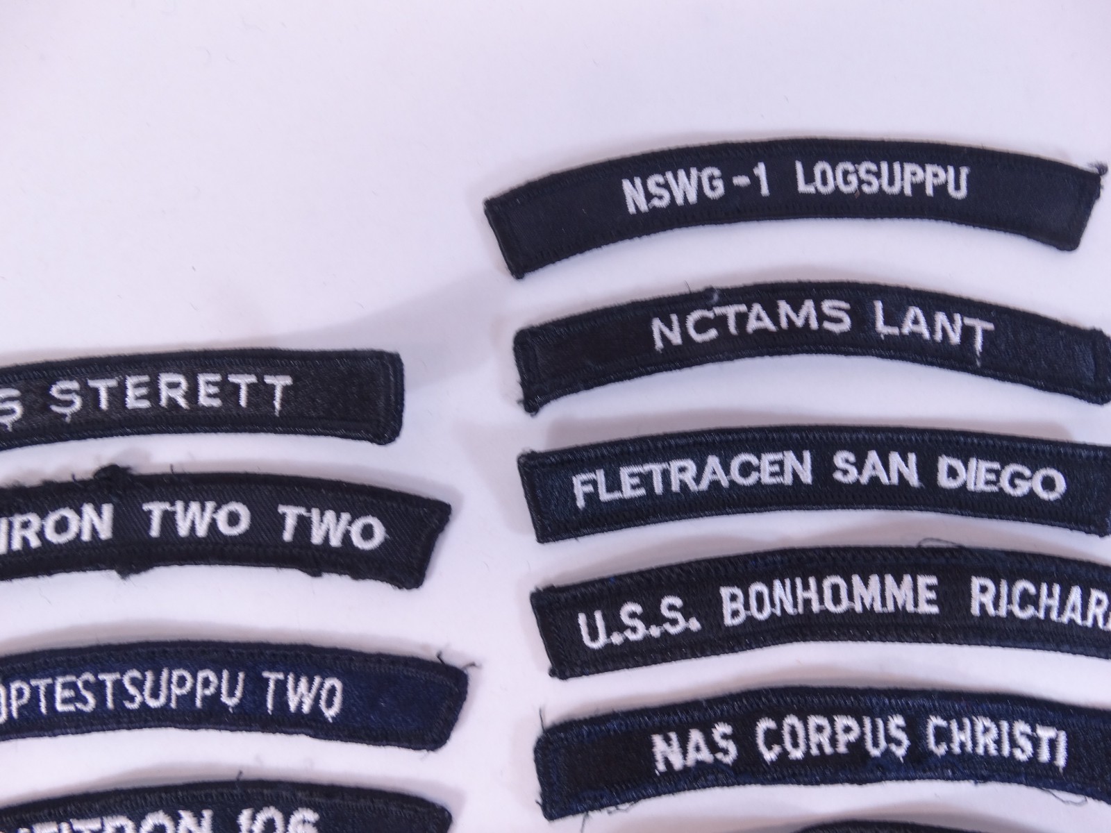 Lot of 28 - US NAVY SHOULDER STRIP TAB Rocker Patches USS Military USA America