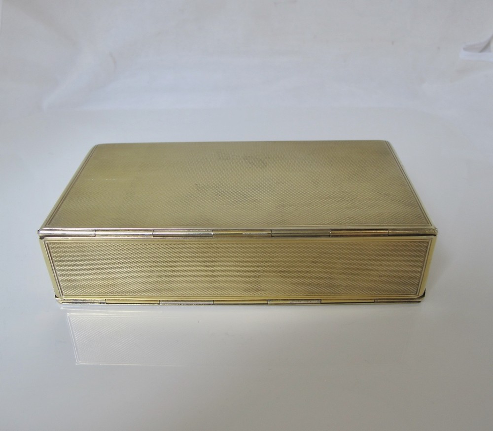 Fine silver-gilt sandwich box with griffin crest Frederick & Louis Marks