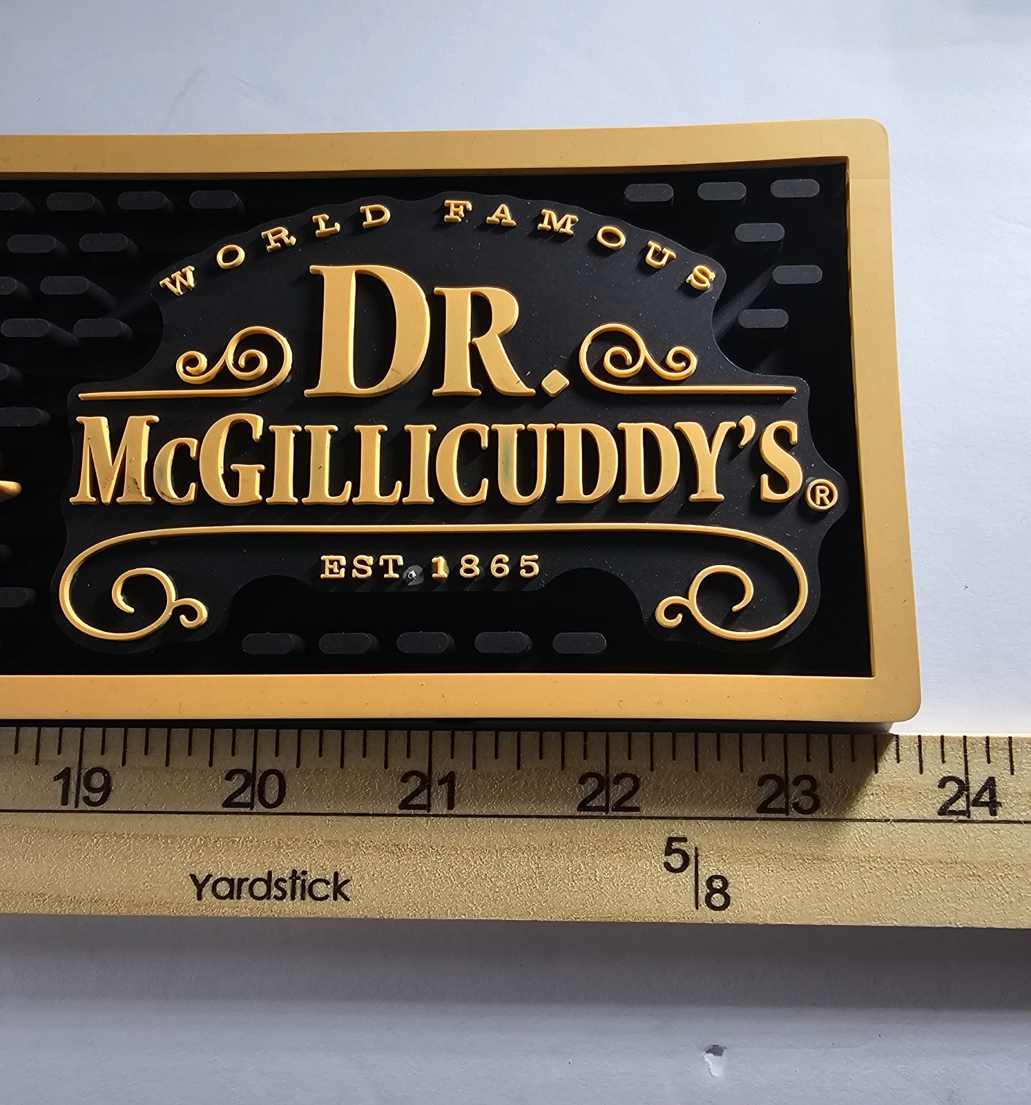 Dr. McGillicuddy's rubber bar mat featuring the brand name A.P. Mcgillicuddys