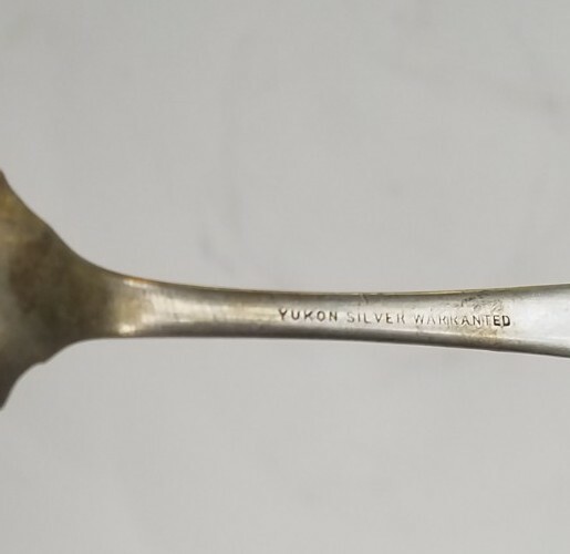 Antique 6 in Shell shape and Design spoon marked Yukon silver warranted