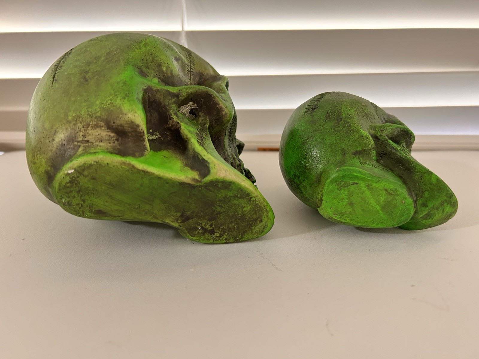 2 EA. RANDOTTI ORIGINAL FLUORESCENT GREEN LARGE & MEDIUM SKULLS STILL GLOW