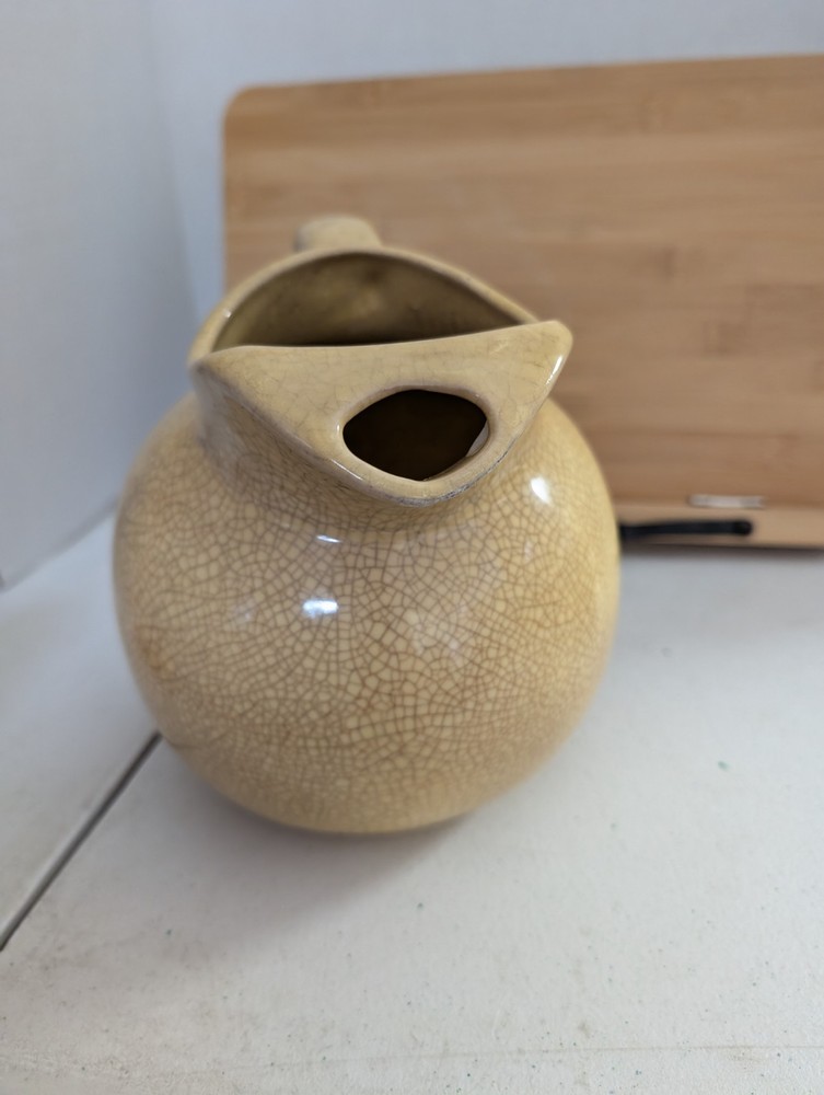 Vintage Yellow Tilted Ball Pitcher