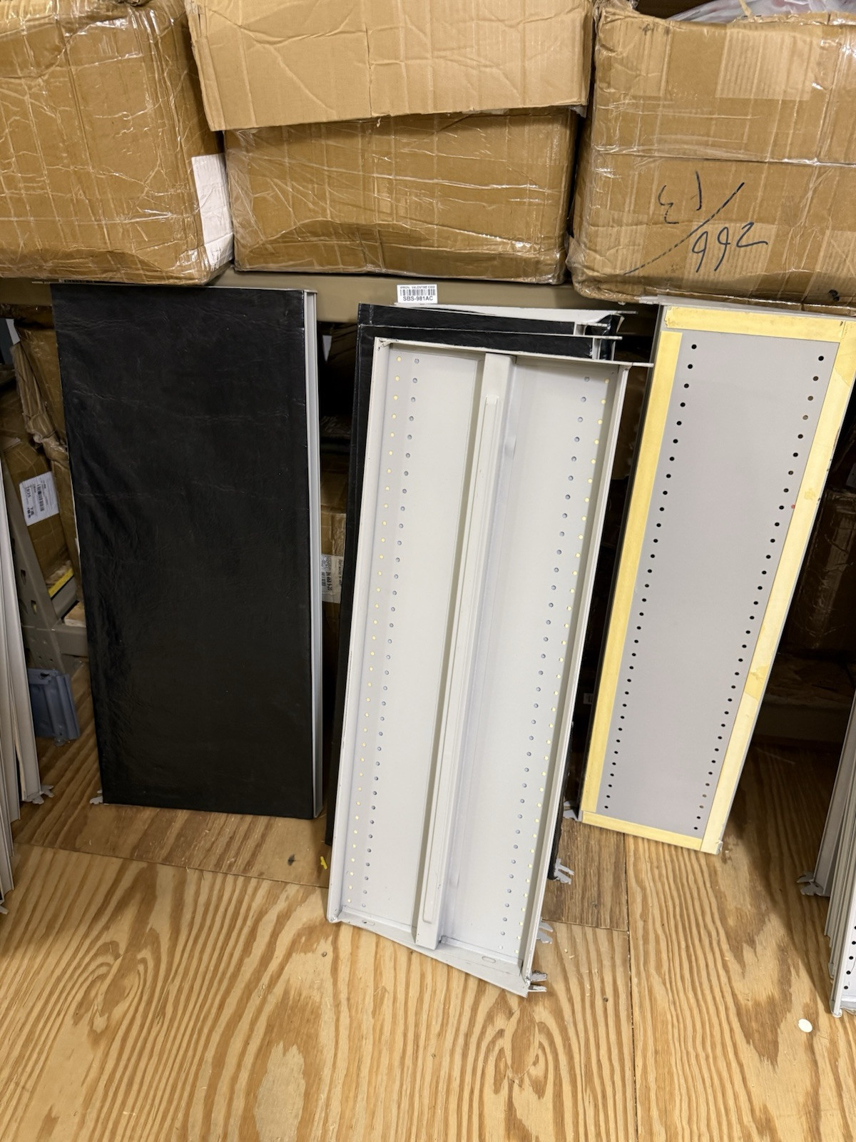 HUGE lot of pallets of Used Lozier Shelving shelves, components, glass cases