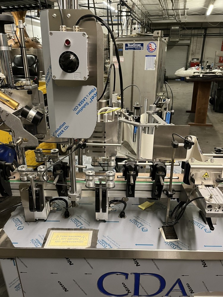 CDA R1000 Bottle Labeler