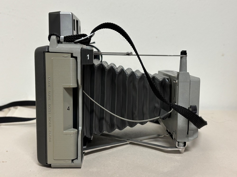Polaroid Land Camera Model 340 W/ Flash, Flashbulbs, and Boxes